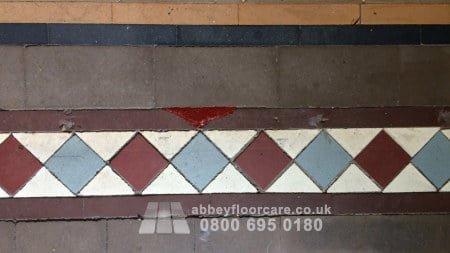 dull Walsall Minton hallway tiles with ingrained soil before restoration