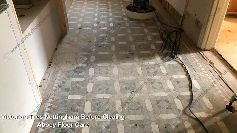 Worn Nottingham Victorian tile hallway before restoration work